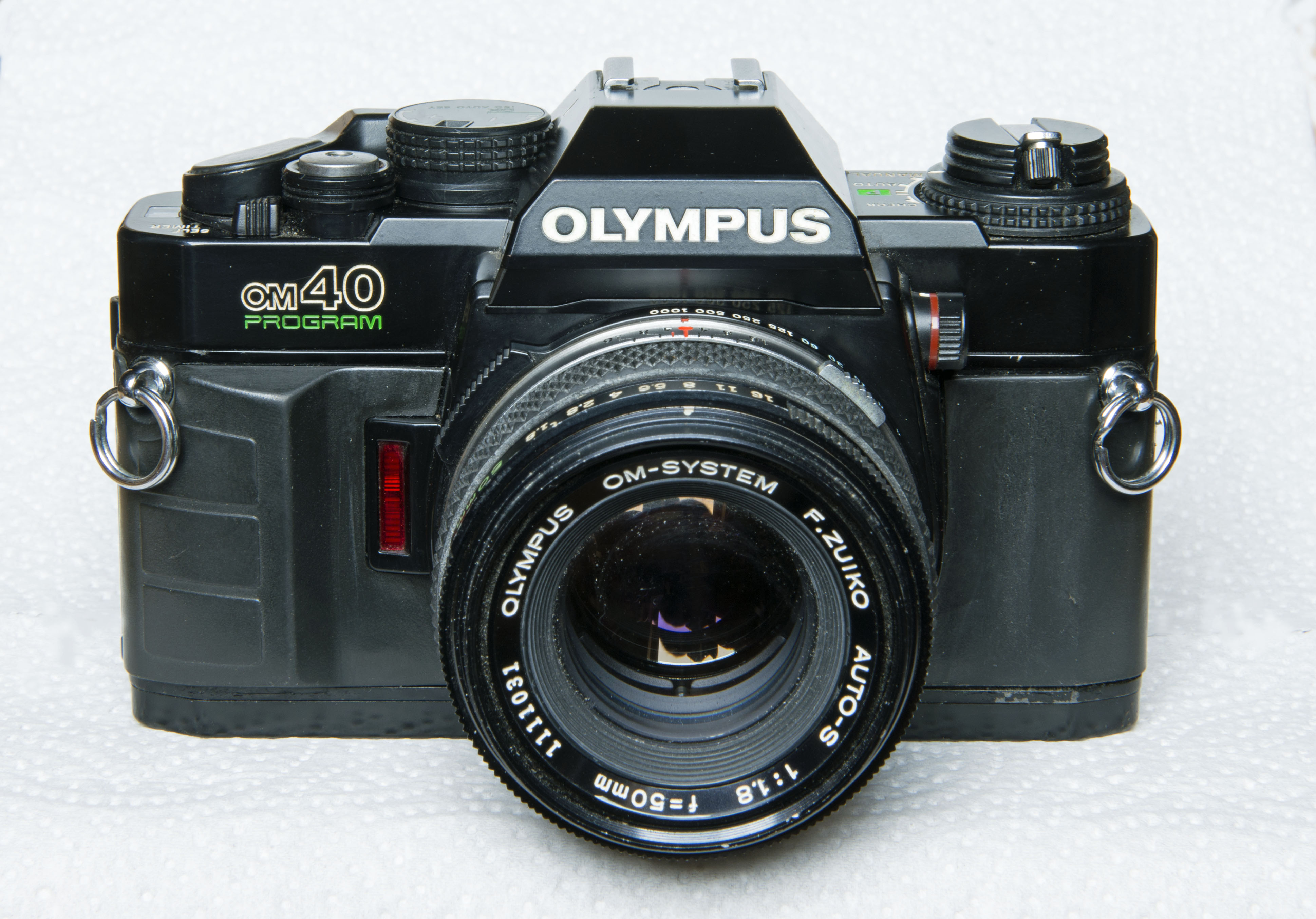 OLYMPUS OM-40 PROGRAM